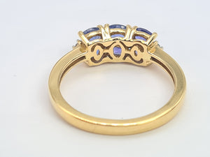 8252: Vintage: 18ct Gold Royal Blue Tanzanites Round Cut Diamonds Geometric Set Ring