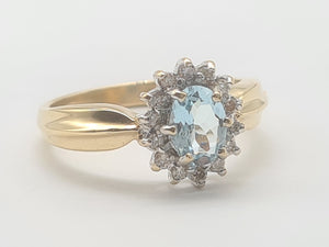 8235: Vintage: 9ct Gold Blue Aquamarine 14 Diamonds Halo Dress Ring