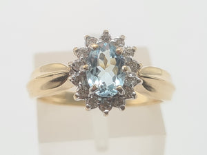 8235: Vintage: 9ct Gold Blue Aquamarine 14 Diamonds Halo Dress Ring