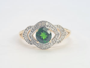 A8344: Vintage: Eye catching 9ct Gold Green Diopside 12 diamonds Halo Dress ring