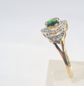 A8344: Vintage: Eye catching 9ct Gold Green Diopside 12 diamonds Halo Dress ring