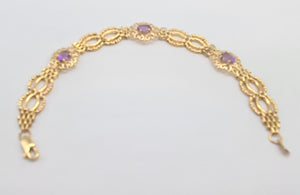 0089: Vintage 9ct Gold Bracelet with oval cut lilac  amethysts in excellent condition.