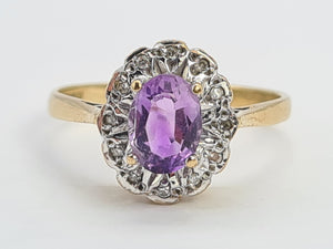 0096: Vintage:9ct Gold Oval Amethyst 12 Diamond Halo Ring-