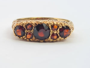 A0034: Vintage; 9ct Gold 7 Red Garnets "Boat" Style Ring- Date Mark 1979