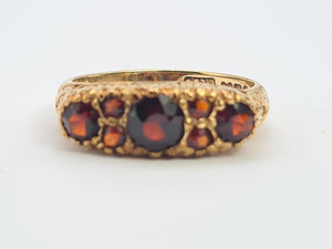 A0034: Vintage; 9ct Gold 7 Red Garnets "Boat" Style Ring- Date Mark 1979