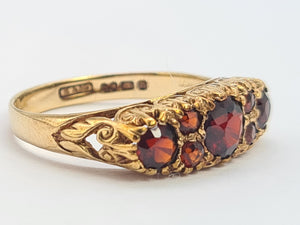 A0034: Vintage; 9ct Gold 7 Red Garnets "Boat" Style Ring- Date Mark 1979