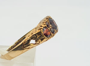 A0034: Vintage; 9ct Gold 7 Red Garnets "Boat" Style Ring- Date Mark 1979