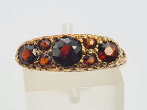 A0034: Vintage; 9ct Gold 7 Red Garnets "Boat" Style Ring- Date Mark 1979