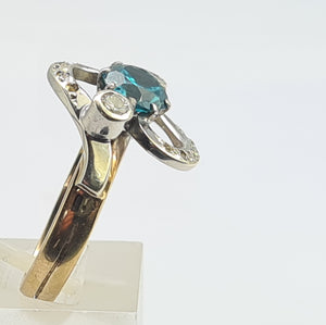 0186: Vintage: Substantial 9ct gold Swiss Blue Topaz Diamonds abstract Cocktail Ring