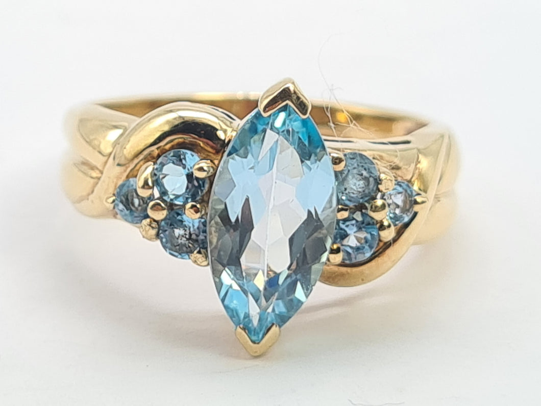 0377: Vintage; Statement 9ct Gold  7 Swiss Blue Topaz Cocktail Ring-