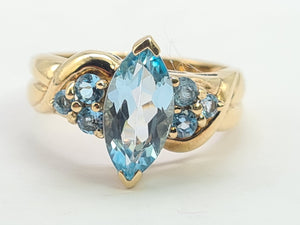 0377: Vintage; Statement 9ct Gold  7 Swiss Blue Topaz Cocktail Ring-