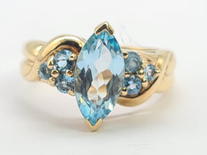 0377: Vintage; Statement 9ct Gold  7 Swiss Blue Topaz Cocktail Ring-