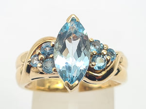 0377: Vintage; Statement 9ct Gold  7 Swiss Blue Topaz Cocktail Ring-