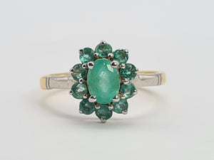 0651: Vintage: 18ct Gold Emeralds Flower Head Ring- white gold detail on shoulders