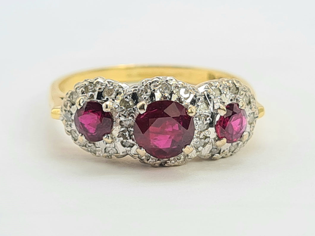 0664: Vintage: luscious 18ct Gold Rubies Diamonds Ring- Date Mark 1976