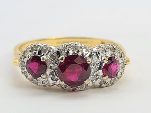 0664: Vintage: luscious 18ct Gold Rubies Diamonds Ring- Date Mark 1976