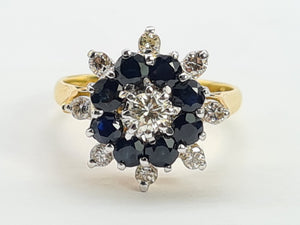 0670: Vintage: 18ct Gold 8 Blue Sapphires 9 Round Cut Diamonds Floral Cluster Ring- Date Mark 1975