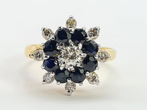 0670: Vintage: 18ct Gold 8 Blue Sapphires 9 Round Cut Diamonds Floral Cluster Ring- Date Mark 1975