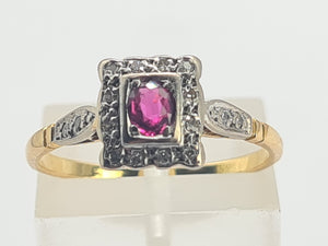 0669: Art Deco- 18ct Gold Ruby 18 Diamonds Geometric Set ring,