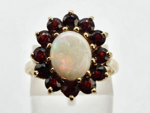 0775: Vintage: 9ct Gold White Opal Red Garnets Flower- Head Cocktail Ring- Date-Mark 1977