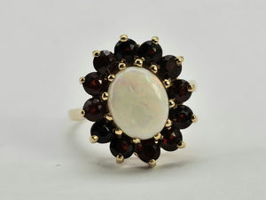 0775: Vintage: 9ct Gold White Opal Red Garnets Flower- Head Cocktail Ring- Date-Mark 1977