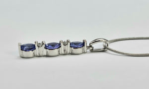 0782: Vintage: 18ct White Gold Necklace (45cm) Tanzanites Diamonds Pendulum Pendant- a beautiful piece