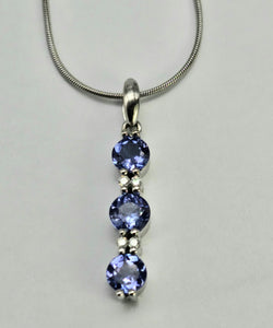 0782: Vintage: 18ct White Gold Necklace (45cm) Tanzanites Diamonds Pendulum Pendant- a beautiful piece