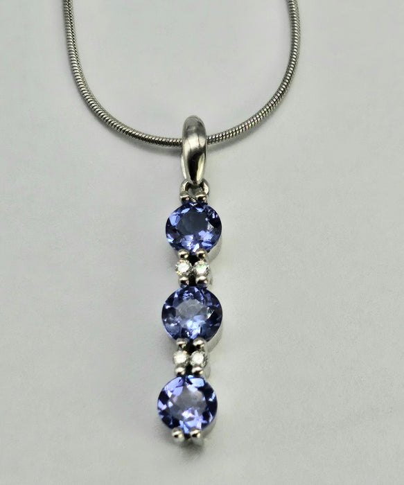 0782: Vintage: 18ct White Gold Necklace (45cm) Tanzanites Diamonds Pendulum Pendant- a beautiful piece