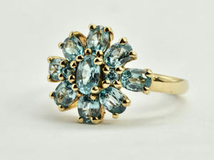 0896: Vintage: 9ct Gold 11 Swiss Blue Topaz Flower Head Ring- inspired design