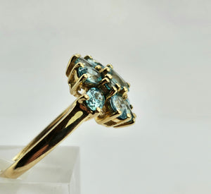 0896: Vintage: 9ct Gold 11 Swiss Blue Topaz Flower Head Ring- inspired design