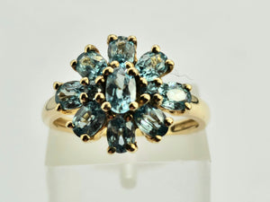 0896: Vintage: 9ct Gold 11 Swiss Blue Topaz Flower Head Ring- inspired design