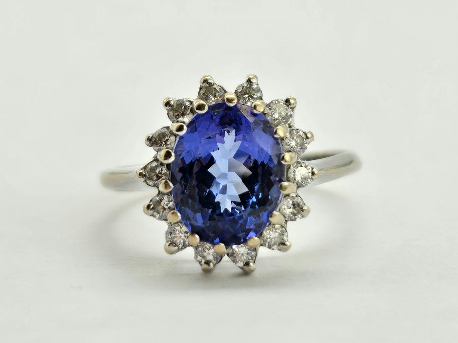 6500 Vintage: 18ct White Gold 2.06ct Tanzanite & Diamond Halo Cluster Ring