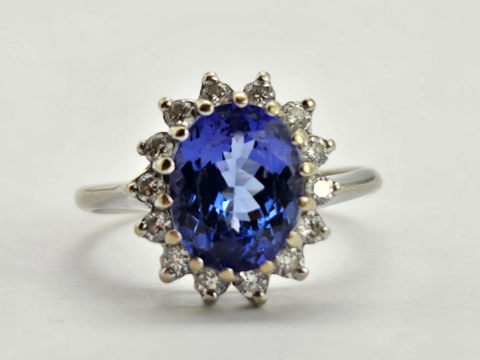 6500 Vintage: 18ct White Gold 2.06ct Tanzanite & Diamond Halo Cluster Ring