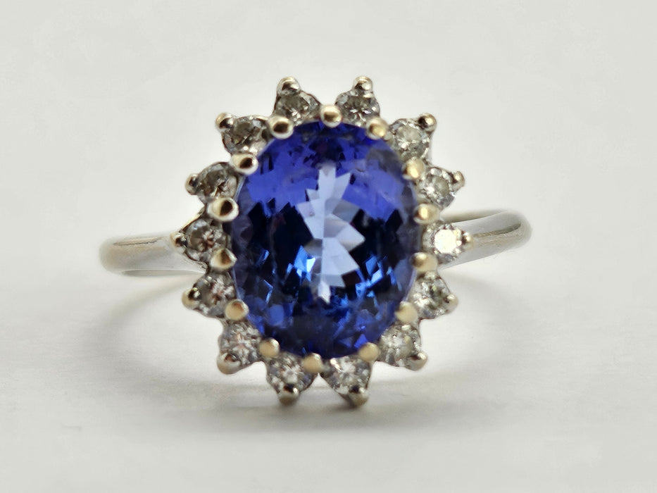 6500 Vintage: 18ct White Gold 2.06ct Tanzanite & Diamond Halo Cluster Ring