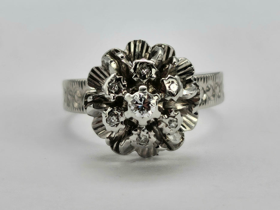 0797: Vintage: 18ct White Gold Round Cut Diamonds Flower Head Ring- Date =-Mark 1974