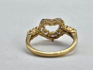 1032: Vintage: 9ct Gold Violet Blue Tanzanites Heart- Set Ring-