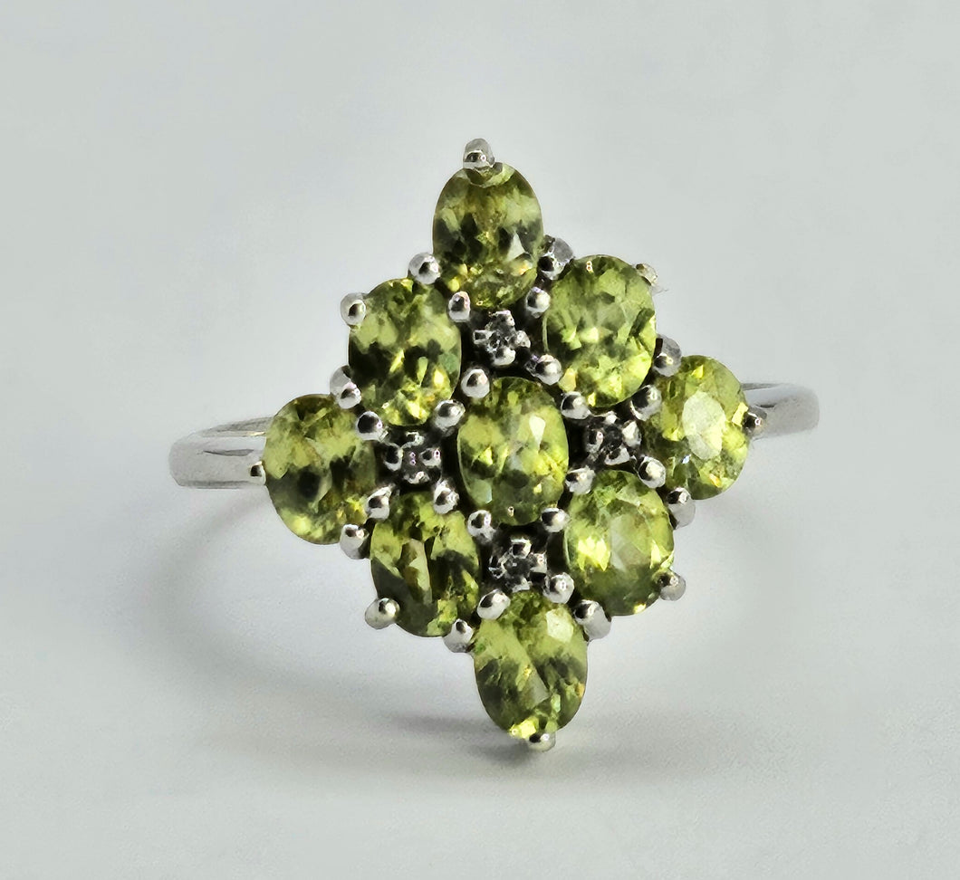 1240: Vintage: 9ct Gold Forest Green Peridots Diamonds Cluster Ring