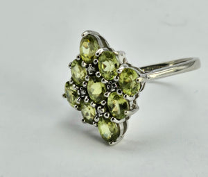 1240: Vintage: 9ct Gold Forest Green Peridots Diamonds Cluster Ring