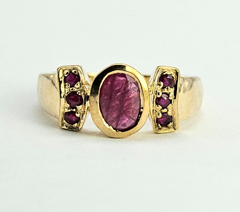 6249 Vintage: 9ct Gold 7 Rubies Geometric Set Ring