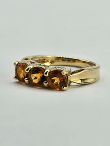 0962: Vintage: 9ct Gold Fiery Orange Citrines Trilogy Ring&nbsp;