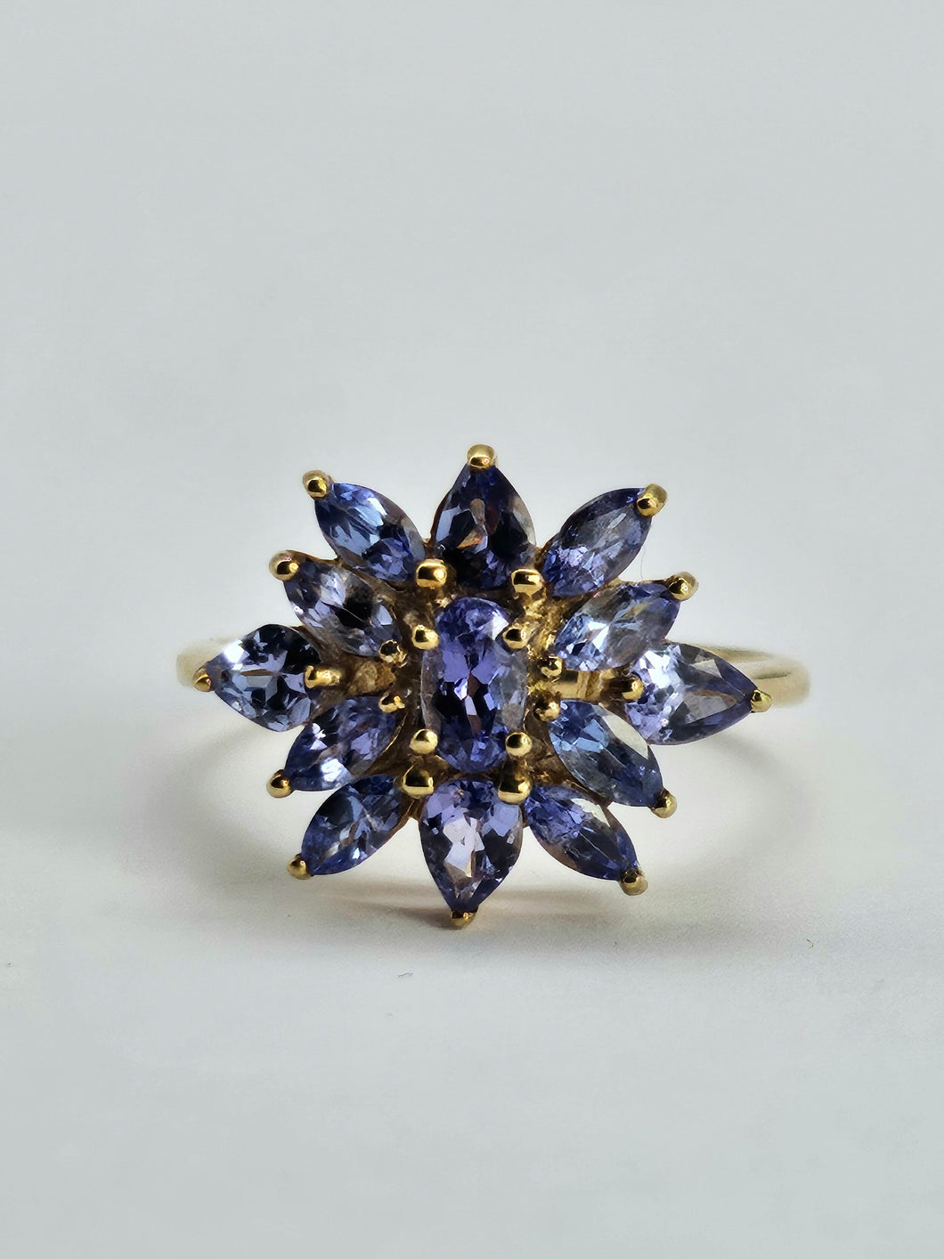 1065: Vintage: 9ct Gold Violet Blue Tanzanites Flower Cluster Ring