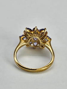 1065: Vintage: 9ct Gold Violet Blue Tanzanites Flower Cluster Ring