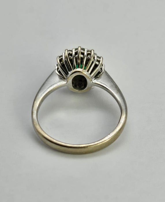 6512  Modern: 18ct White Gold Emerald & Diamond Oval Cluster Ring — From 2016