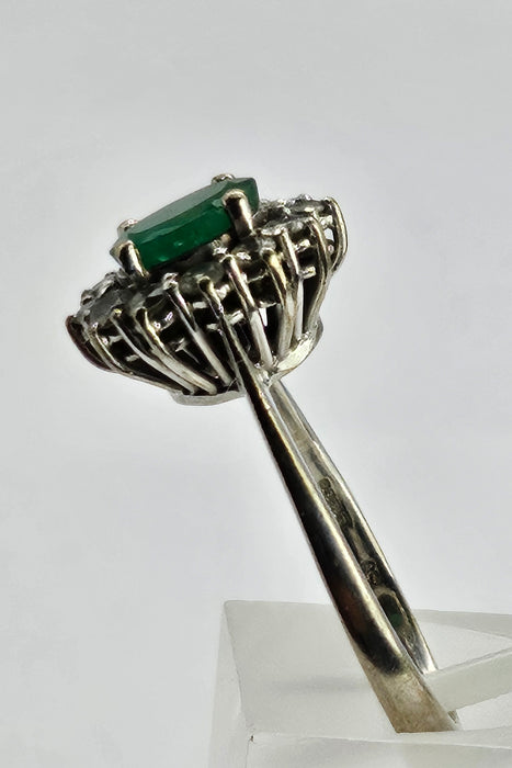 6512  Modern: 18ct White Gold Emerald & Diamond Oval Cluster Ring — From 2016