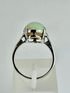 1148: Vintage; 9ct Gold Large White Cabochon Cut Opal Ring