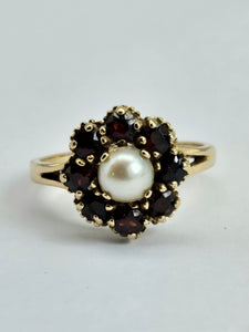 1169: Vintage: 9ct Gold 8 Rich Red Garnets Pearl Flower Head Ring- From 1965