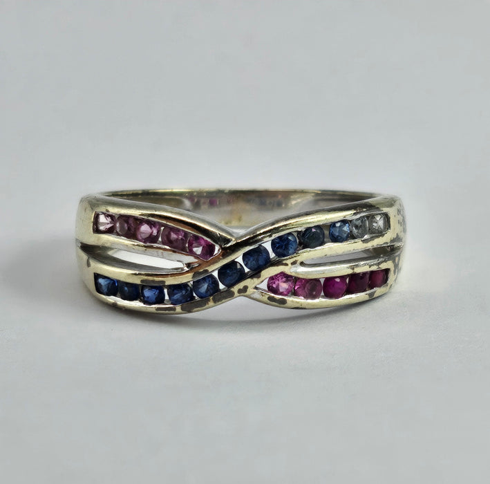 1429: Vintage: 9ct White Gold Rubies Sapphires Crossover Ring- crisp, colourful, eye candy