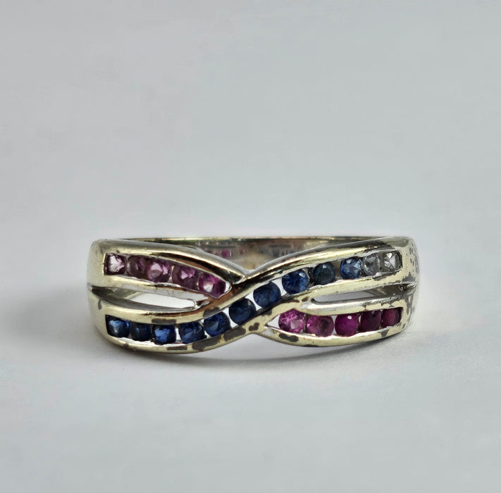 1429: Vintage: 9ct White Gold Rubies Sapphires Crossover Ring- crisp, colourful, eye candy