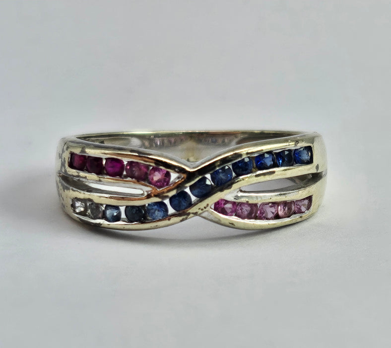 1429: Vintage: 9ct White Gold Rubies Sapphires Crossover Ring- crisp, colourful, eye candy