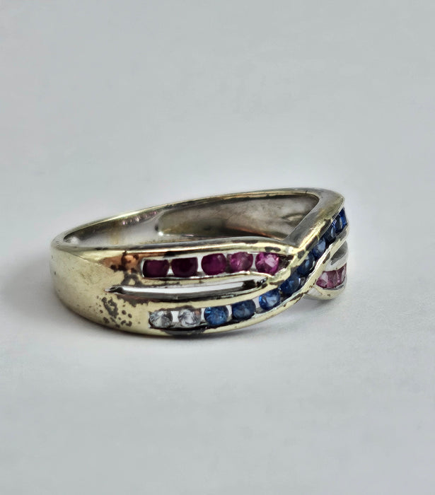 1429: Vintage: 9ct White Gold Rubies Sapphires Crossover Ring- crisp, colourful, eye candy